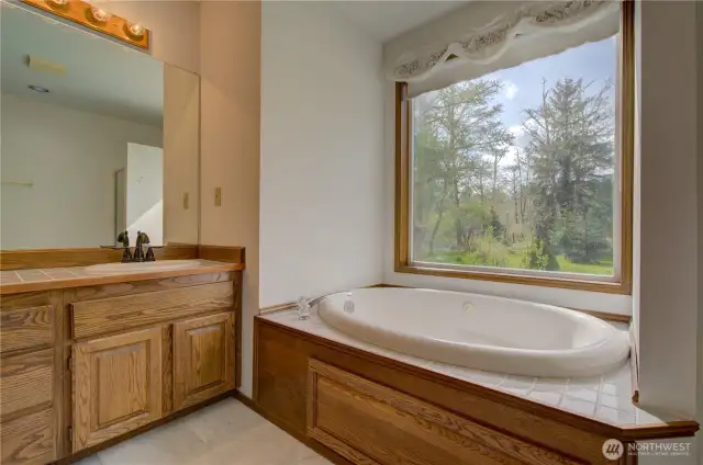 Primary suite with walk in shower and full bath.