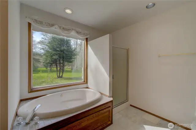 Primary suite with walk in shower and full bath.