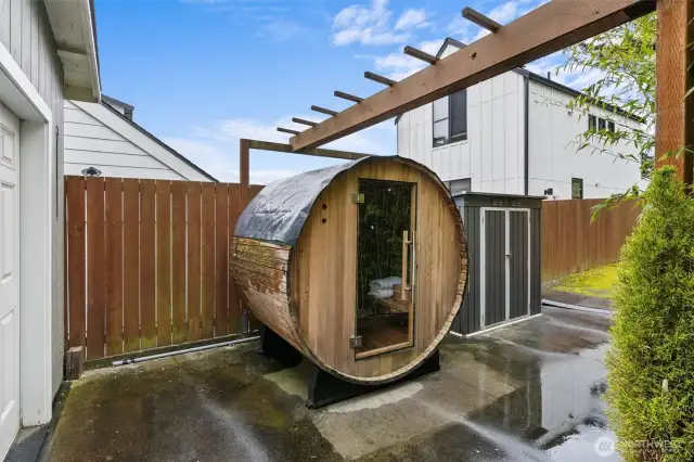 To the right of the sauna is the 'extra lot' (the extra 360sf of Lot size) that serves as Additional Parking with Alley Access.
