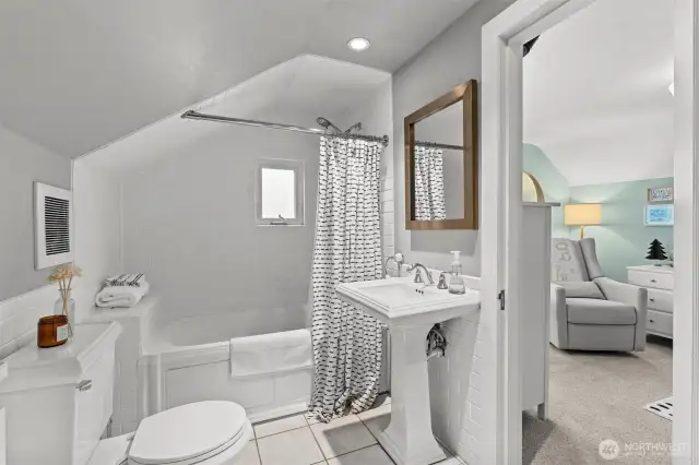 Full bath on second floor features radiant floor heating and a jacuzzi tub.