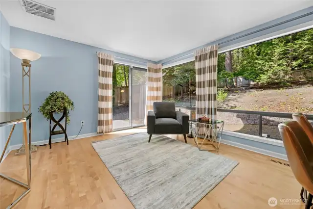 Good sized Family room with hardwood floors & slider to the backyard