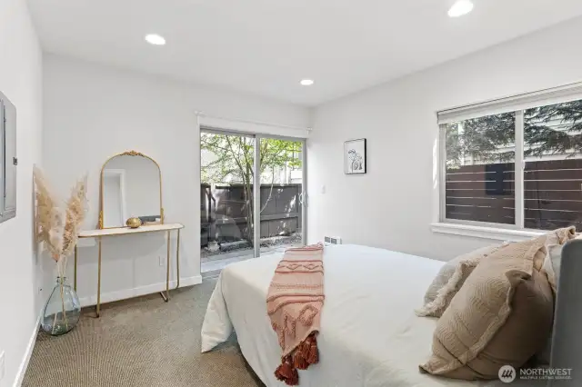 Convenient access to enclosed backyard from this entry level bedroom.