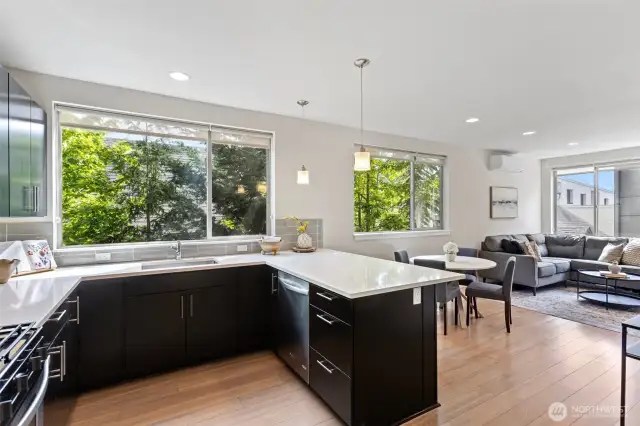 Enjoy the lush green surroundings and the calming ambiance from the large windows, tucked away from the street.