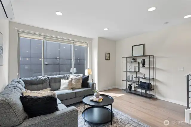 This air conditioned level is spacious and full of light. Lots of wall space for art and a television screen.