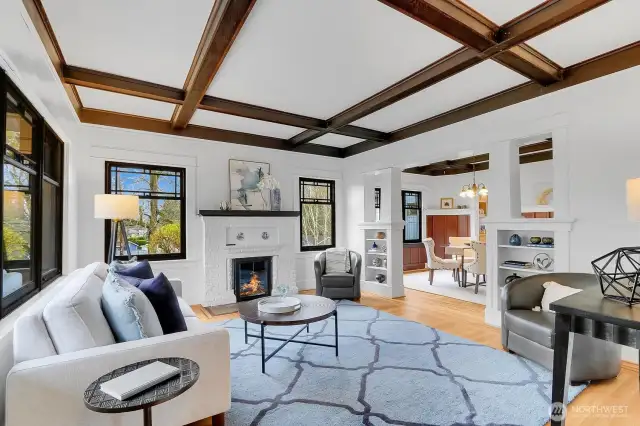 Living Room with Mantled Gas Fireplace & Boxed Beam Ceilings
