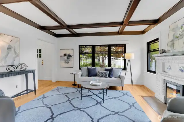 Living Room with Mantled Gas Fireplace & Boxed Beam Ceilings