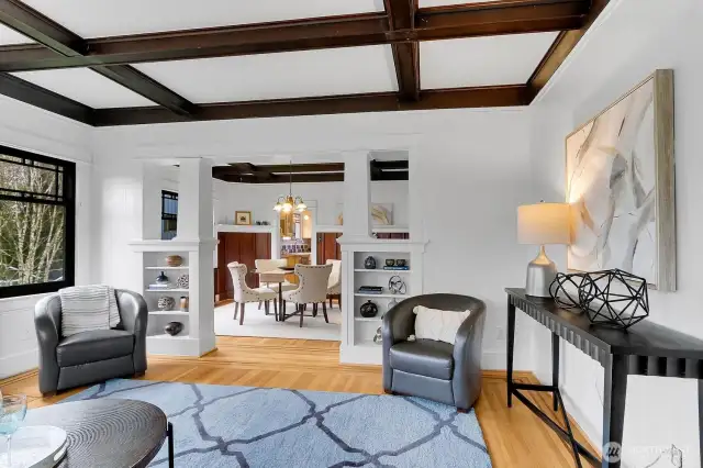 Living Room with Mantled Gas Fireplace & Boxed Beam Ceilings