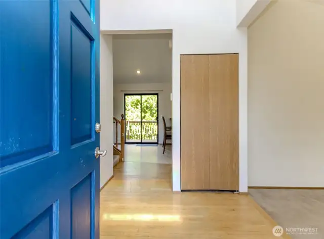 Hardwood entry, high ceiling and abundant natural light