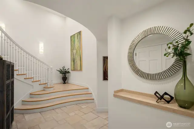 Step into the grand foyer 2001 built home entrance on the middle floor.  The residence is up the staircase, Offices are to the right.