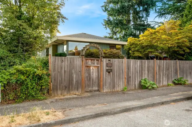 Fully fenced yard. Large private front yard