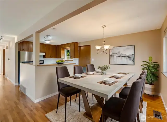 Open kitchen and dining room for entertaining (virtually staged)