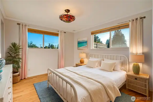 Primary bedroom with a half bath (virtually staged)