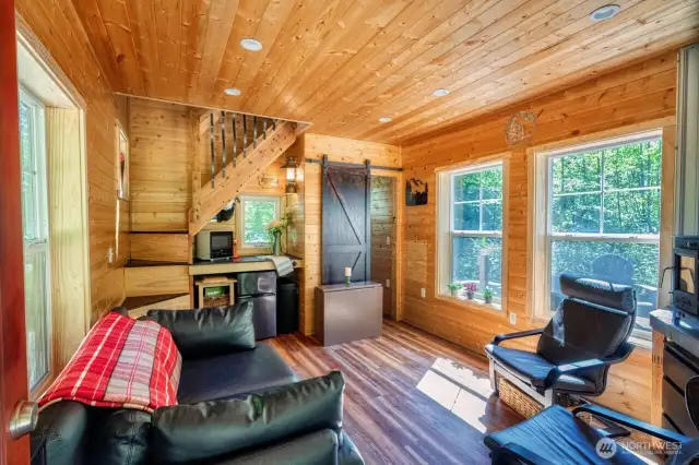 Beautiful craftsmanship makes this cabin unforgettable. You will adore the abundance of natural light!