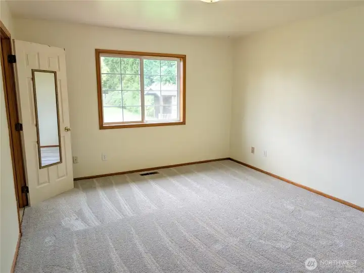 Large primary bedroom. New carpets installed 7/18!