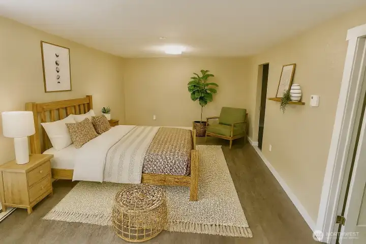 Primary bedroom on ground level *virtually staged