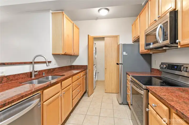 Stainless and granite compliment the great kitchen