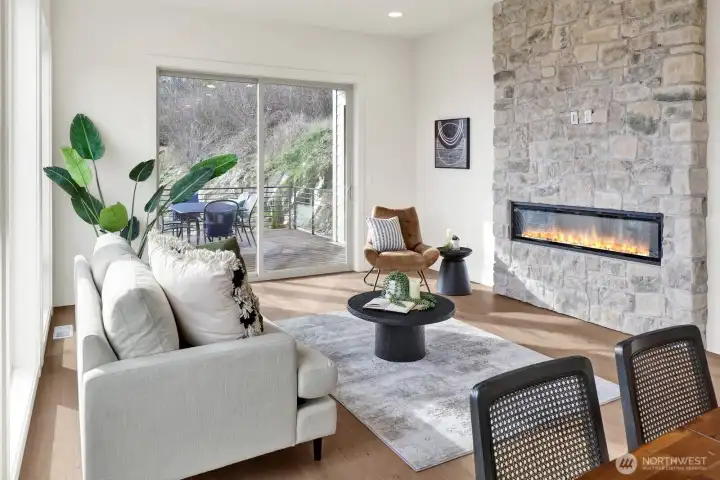 Cozy fireplace and stunning stone surround