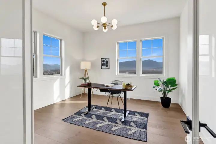 On the main level there is a large, bright office adjacent to the front entry