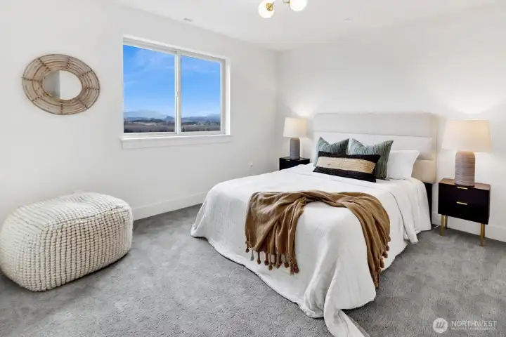 Upstairs find secondary bedroom #2...large and facing the view