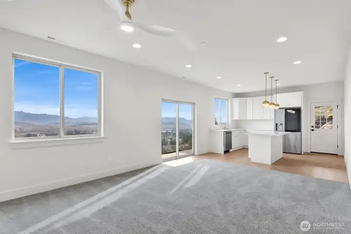 Downstairs features a separate suite with its own exterior entrances...a sliding door and a man-door.