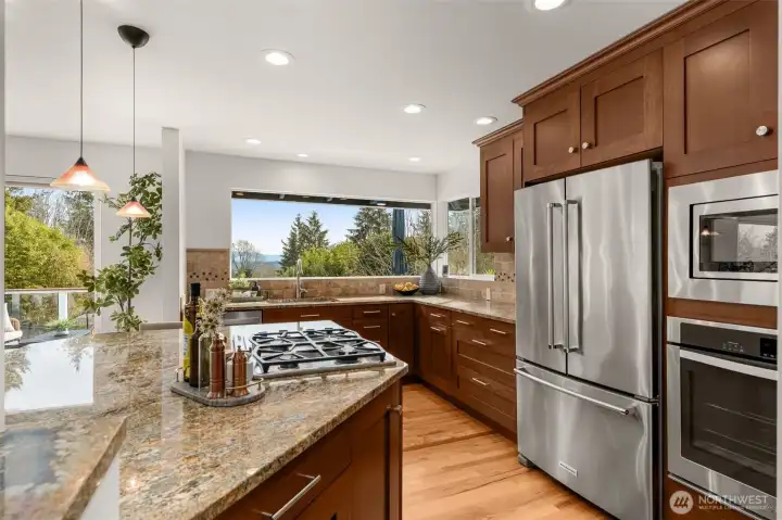 Wonderful layout allows for multiple cooks, as well as some hangout space for the those that don't want to get in the way of the action.