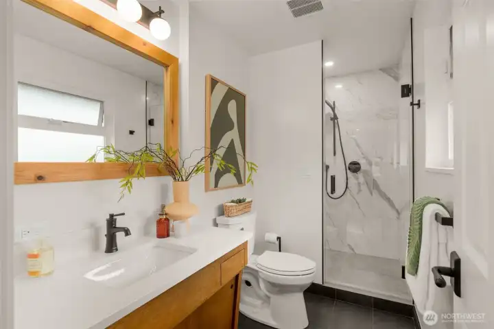 You will LOVE this Bathroom...floors are heated, including the shower pan. Wonderful natural light!