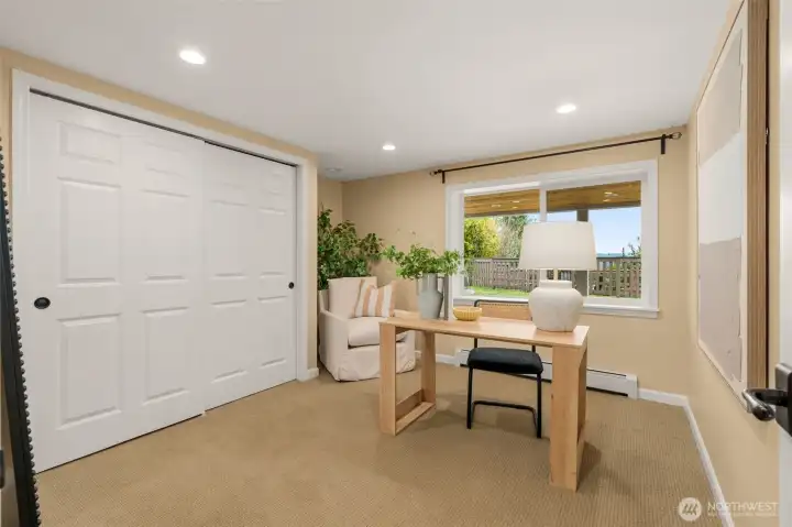 Daylight Lower Level Bedroom is also a wonderful room to use as an Office- large, deep sill window offers a nice view of the yard and is totally private!