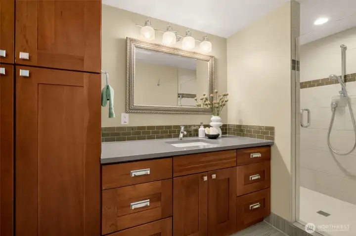 Large 3/4 Bathroom on Lower Level with heated floors, large shower, and generous storage!