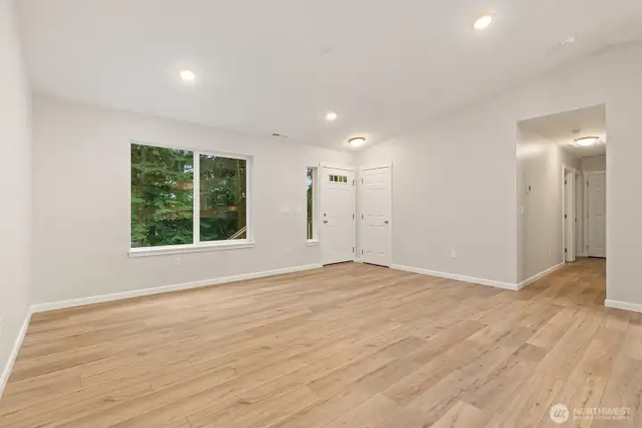 Durable plank flooring span throughout the main living areas!