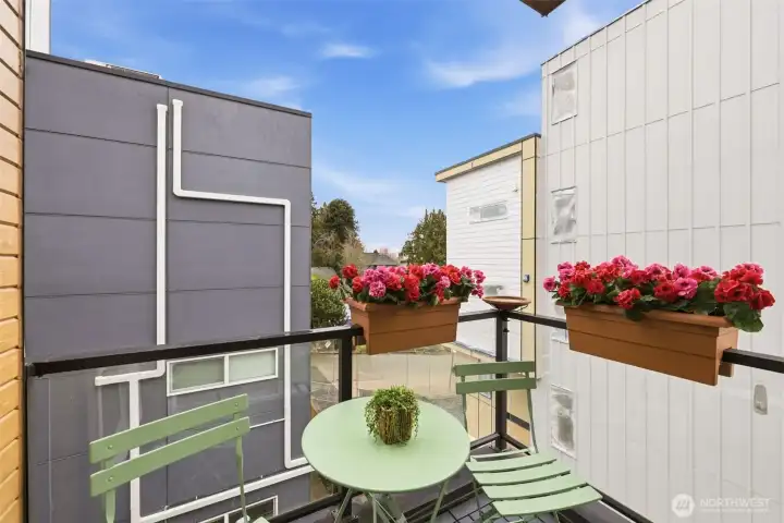 The deck off the dining room and living room, with convenient access from the kitchen.