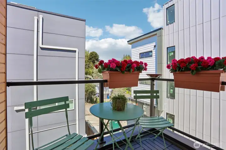 The deck off the dining room and living room, with convenient access from the kitchen.