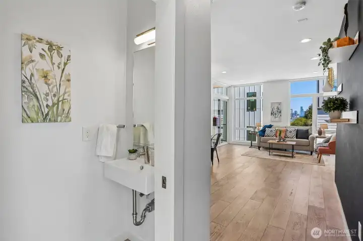 Half-bath on the 3rd level, near the kitchen, dining room and living room.