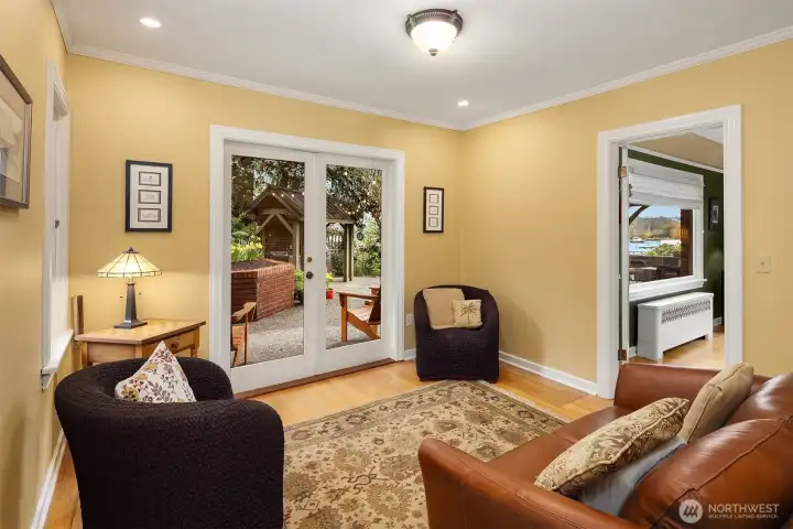 Sitting room located off the living room with access to back private patio
