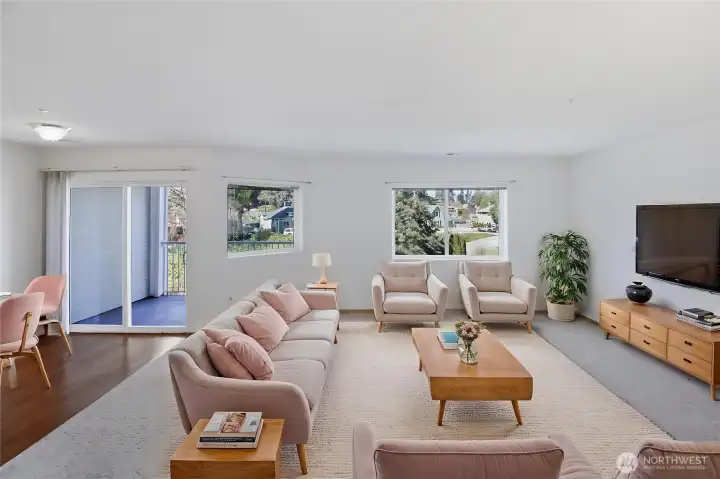 Open living space for entertaining *virtually staged