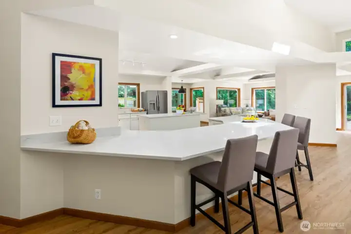 An oversized and exquisite island in the kitchen adds ease to entertaining.