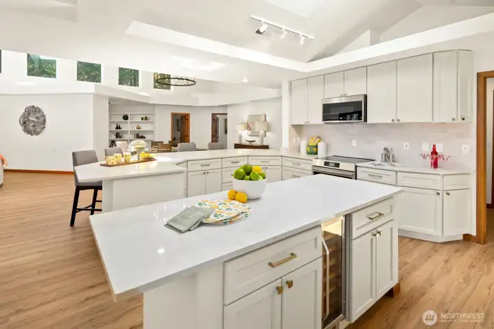 Storage galore and plenty of prep space throughout the large light kitchen!