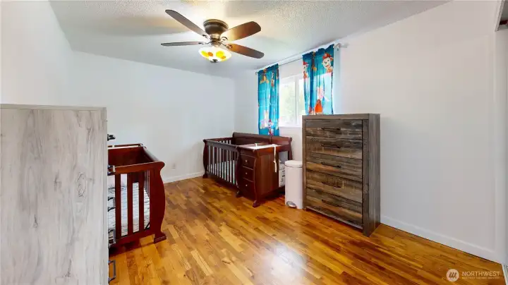 Third bedroom offering a clean palate, ample closet storage, and flexible layout options.