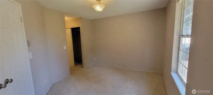 On the right of the front door is the officespace that can also be used as a bedroom with double doors, dual closets and attached to the main bath downstairs.