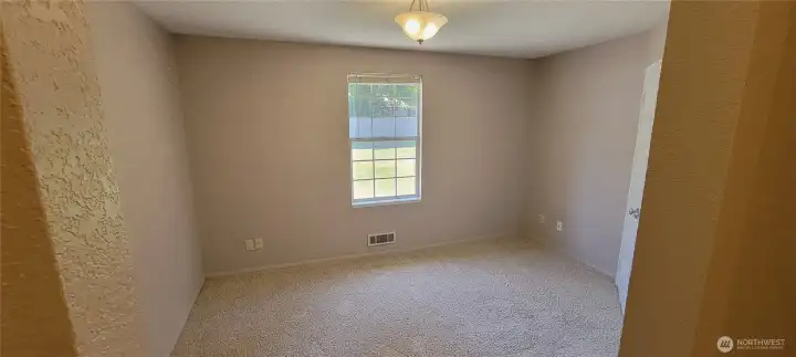 View from the downstairs bath into the office/bedroom.