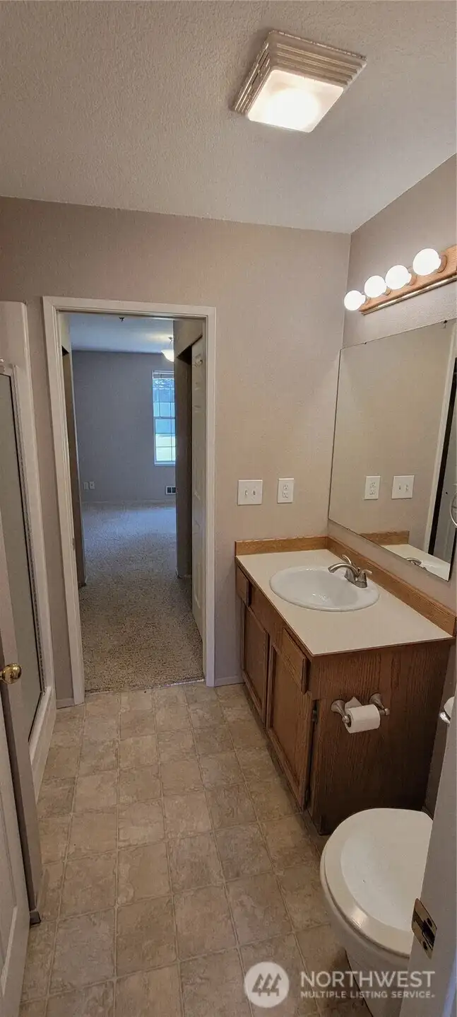 Vanity in downstairs bath looking into the office/bedroom.