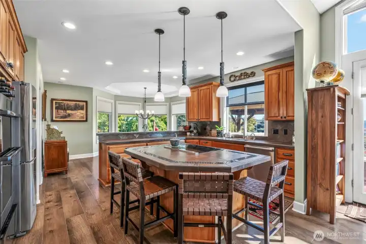 Tons of cabinets and upper end appliances.