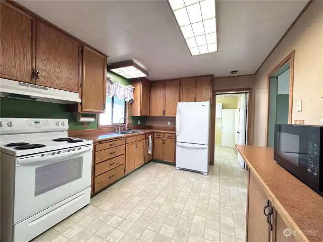 Kitchen view towards laundry/mud room