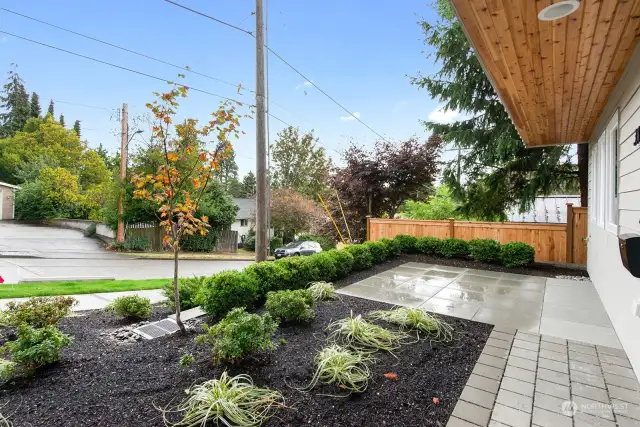 Entry Patio plus landscaped Yard.