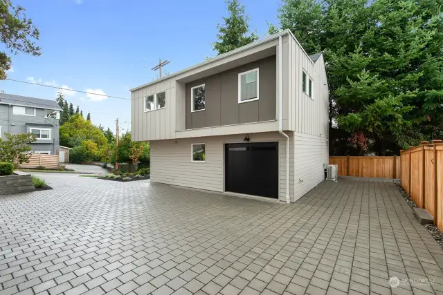 This Home includes 1-Car Garage with EV Charging outlet plus second dedicated off-street parking space.  Easy access Driveway.