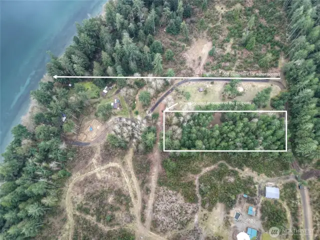 Property Outline.  Straight line indicates one path to the sandy beach.