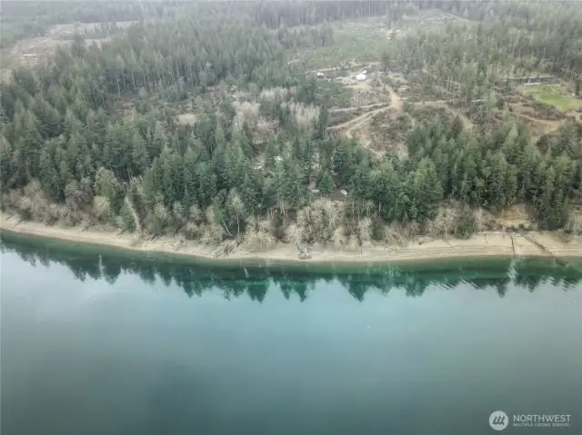 Drone view looking back at sandy beach