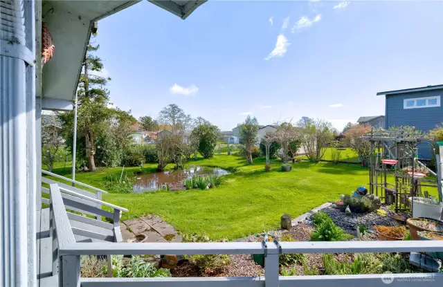 From the deck looking towards the fenced and landscaped back yard.