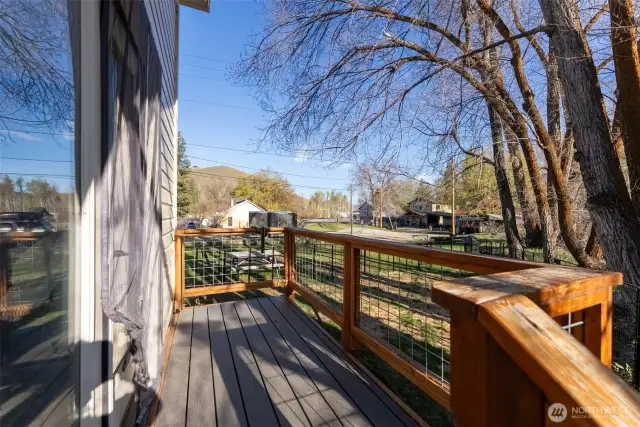 Small deck off of primary bedroom could be perfect for your morning coffee.