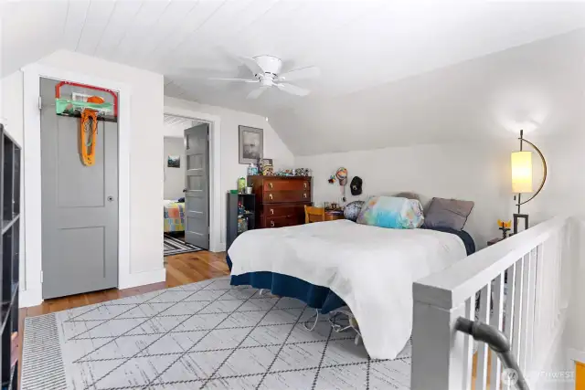 Walk-through room has a closet for storage.