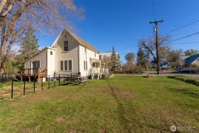 Classic home with large front and side yards.